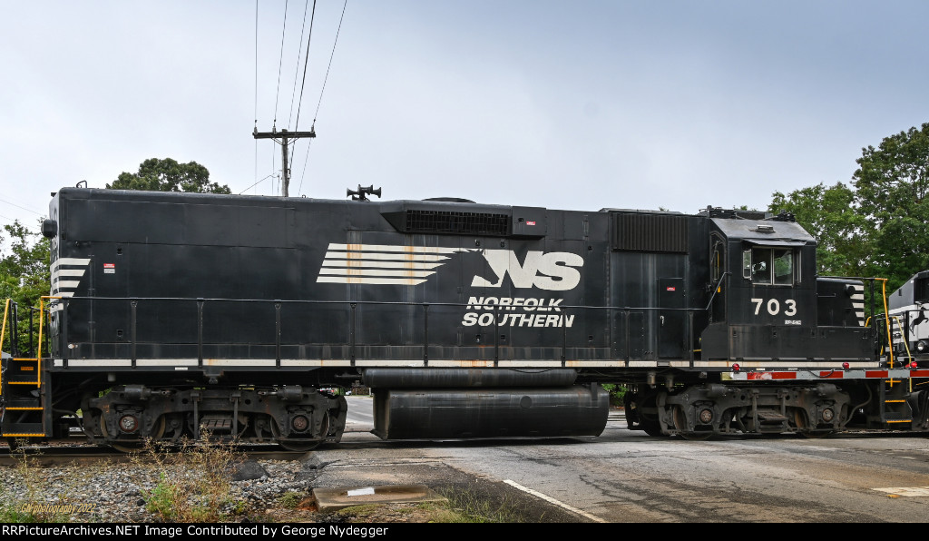 NS 703